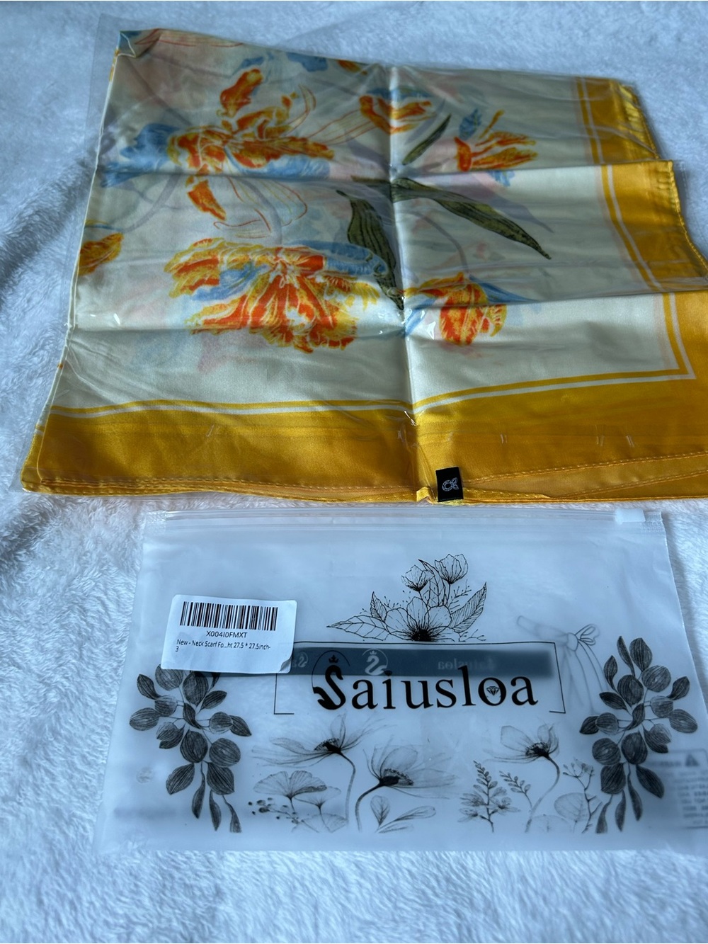 Saiusloa  floral-patterned scarves and wraps, neck scarves, handbag wraps.